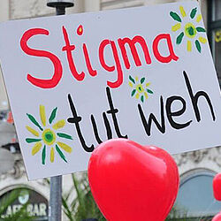 Plakat mit der Aufschrift Stigma tut weh